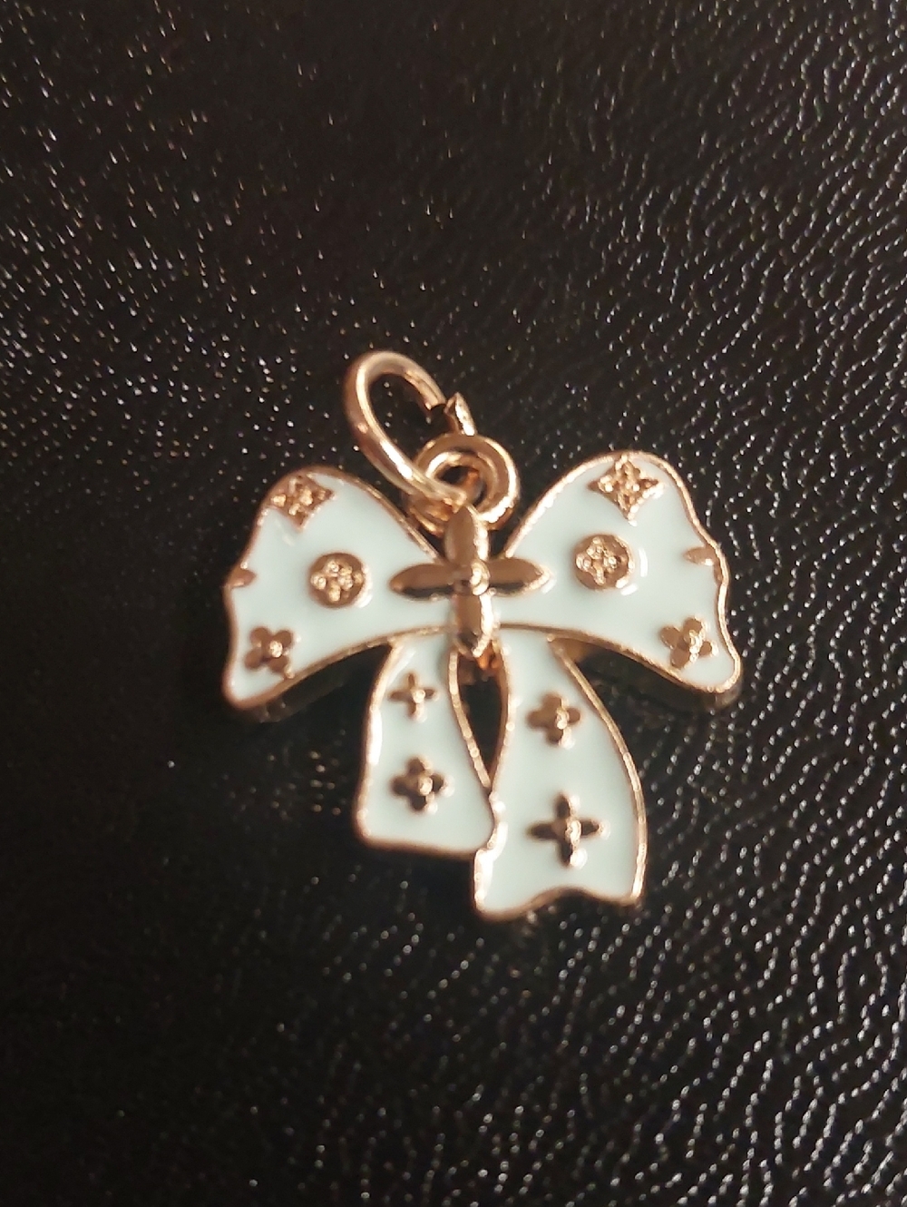 LV Gold-Tone Bow Pendant with Sky Blue Enamel and Accent Details